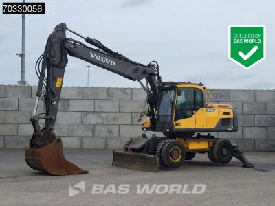 Volvo EW210 D Outrigers + Blade Photo 1