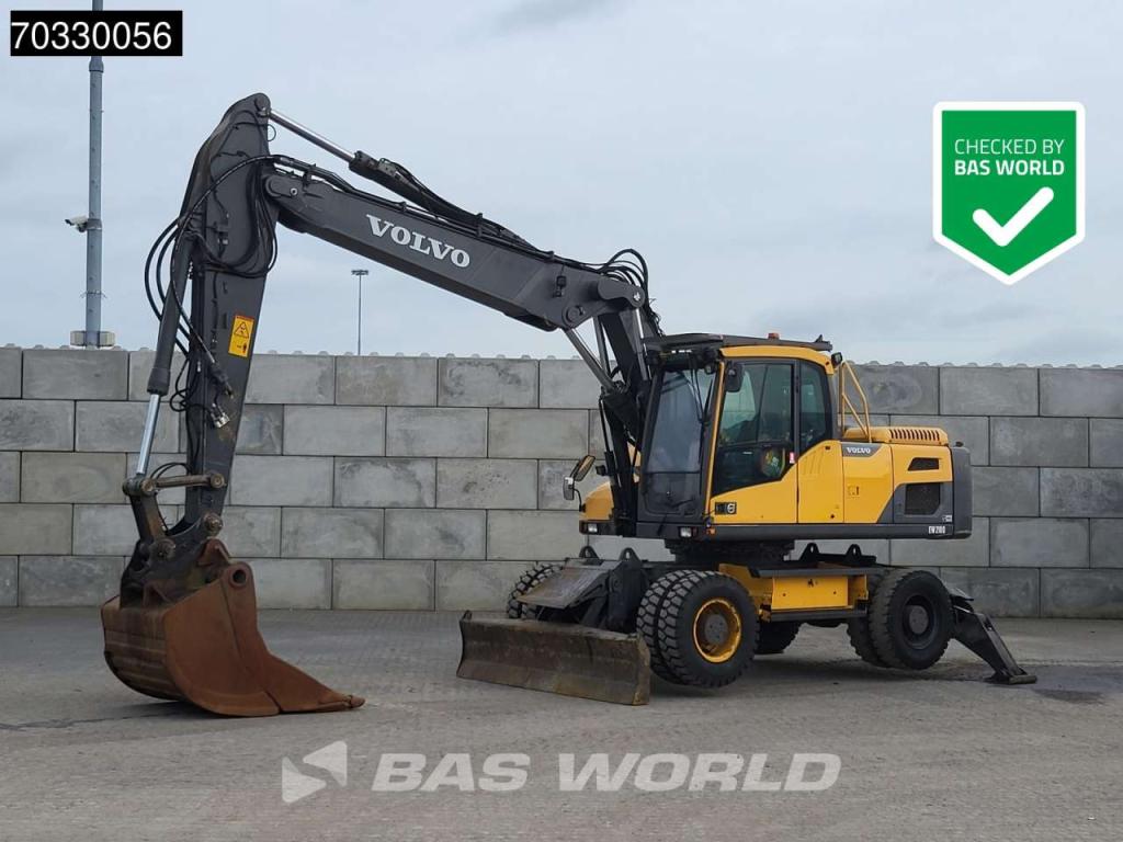 Volvo EW210 D Outrigers + Blade Photo 1