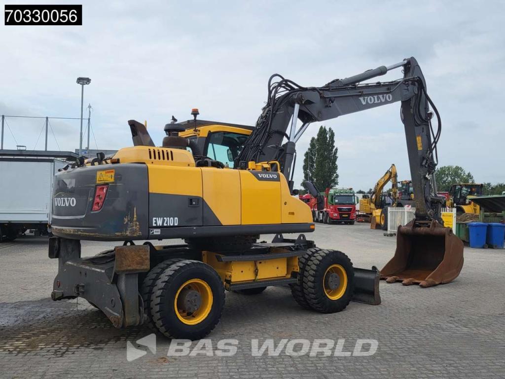 Volvo EW210 D Outrigers + Blade Photo 10