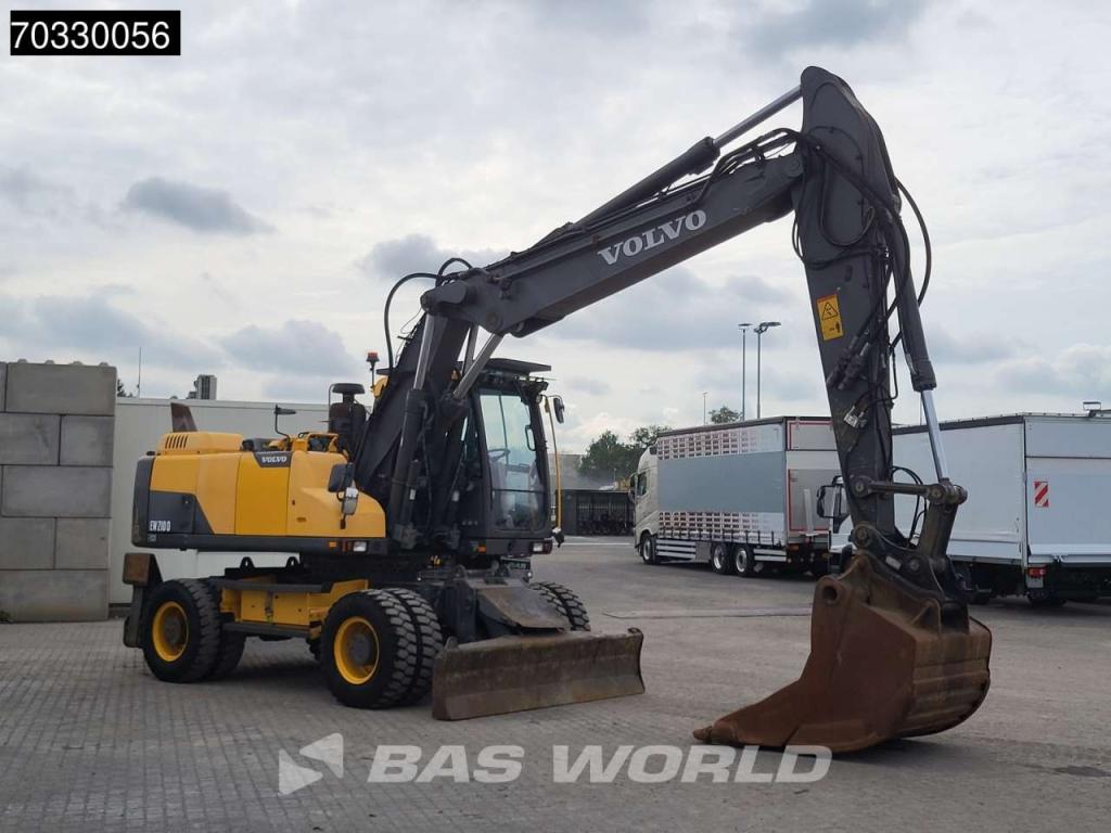 Volvo EW210 D Outrigers + Blade Photo 11