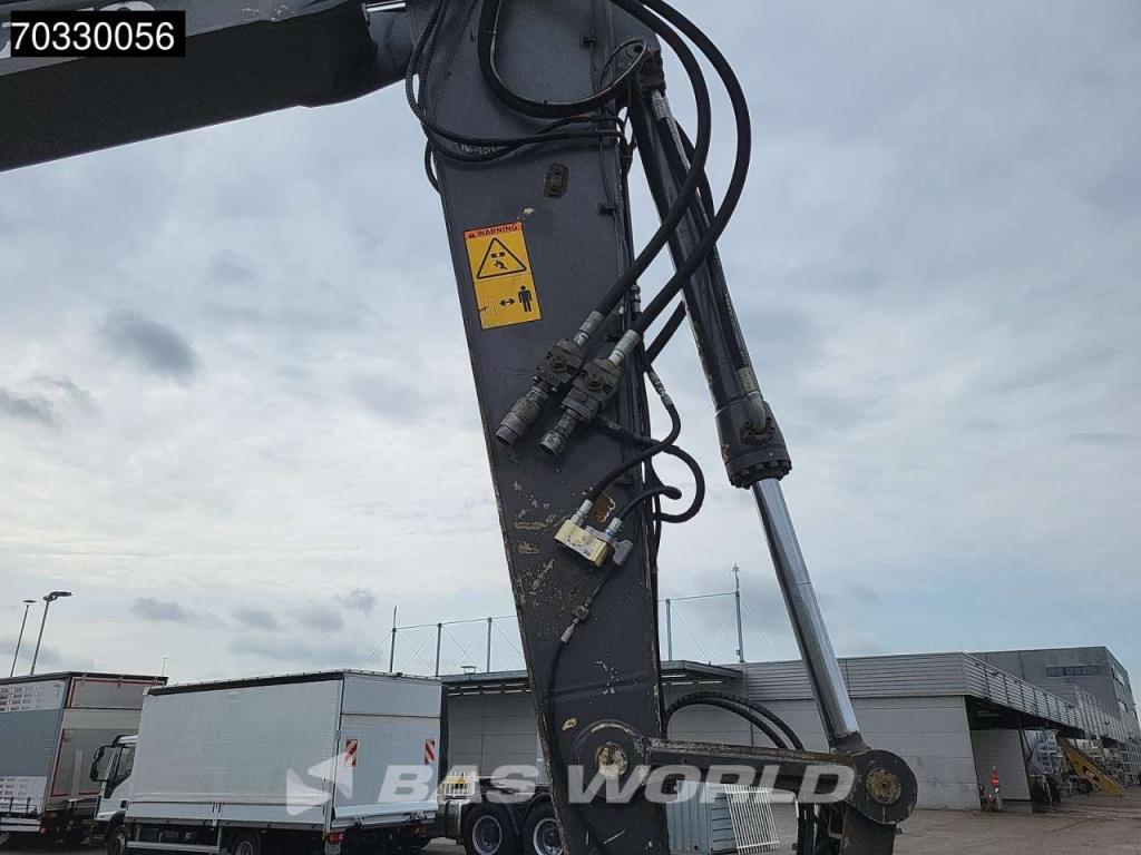 Volvo EW210 D Outrigers + Blade Photo 16
