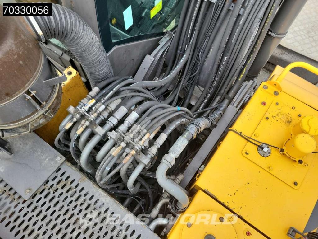 Volvo EW210 D Outrigers + Blade Photo 25