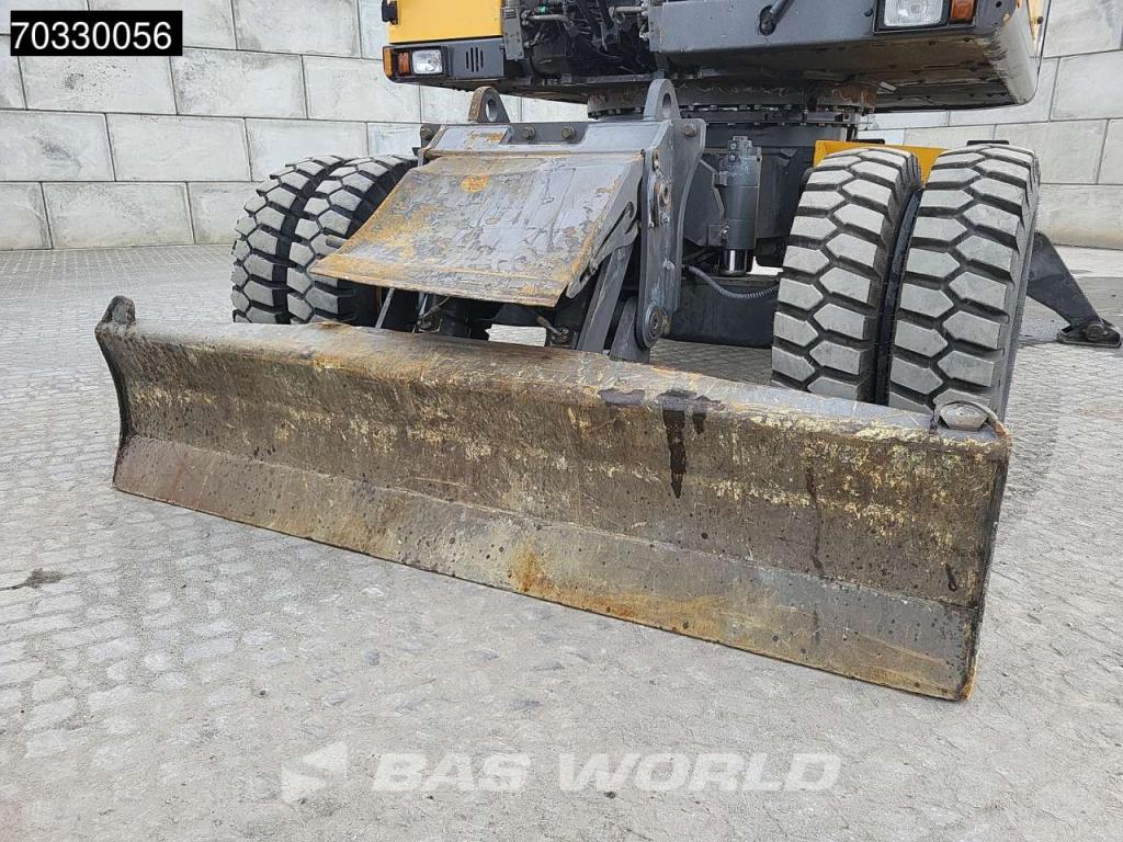 Volvo EW210 D Outrigers + Blade Photo 30