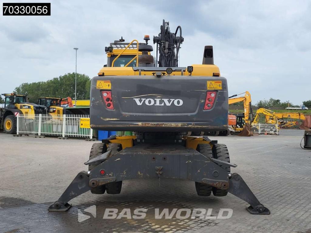 Volvo EW210 D Outrigers + Blade Photo 6