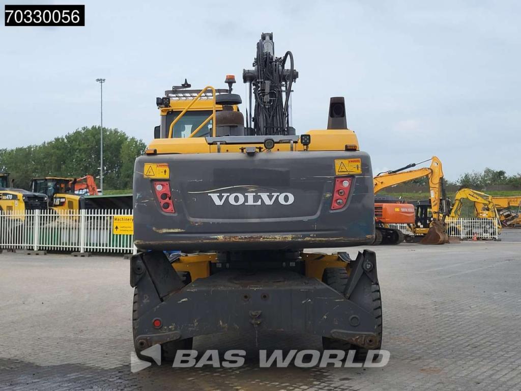 Volvo EW210 D Outrigers + Blade Photo 8
