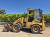 Komatsu WB70A Photo 2 thumbnail