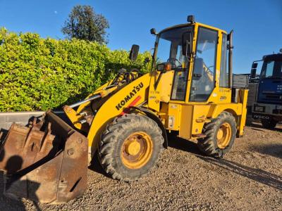 Komatsu WB70A sold by Omeco Spa