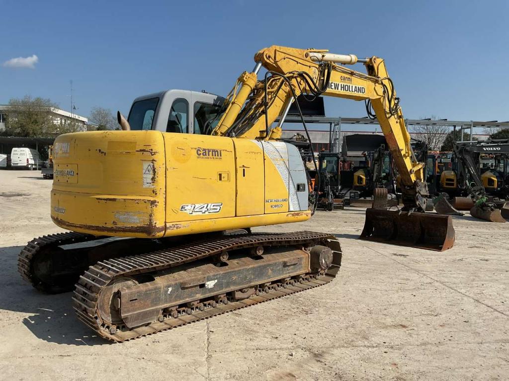 New Holland E145 Photo 4